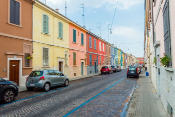 Colorful houses on the Via della Salute, Parma, Italy