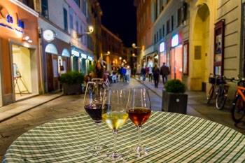 Wine in the enoteca on Farini Street, Parma, Italy